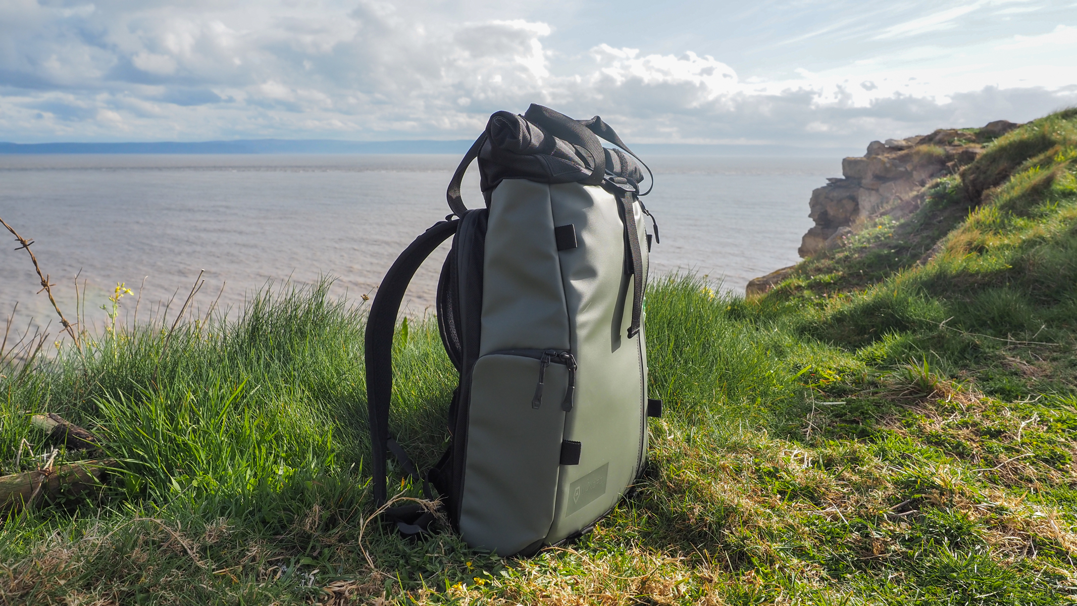 WANDRD PRVKE Lite on a cliff