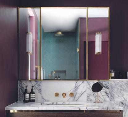 how to use bold color in the bathroom with marble backsplash and purple walls