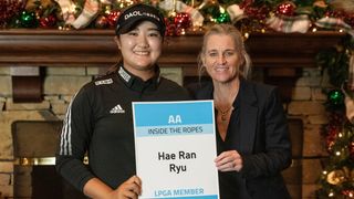 Hae Ran Ryu with her LPGA Tour card alongside Mollie Marcoux Samaan