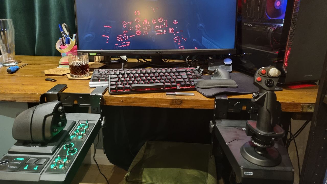 The Hori HOTAS flight control system mounted to a desk and playing DCS World
