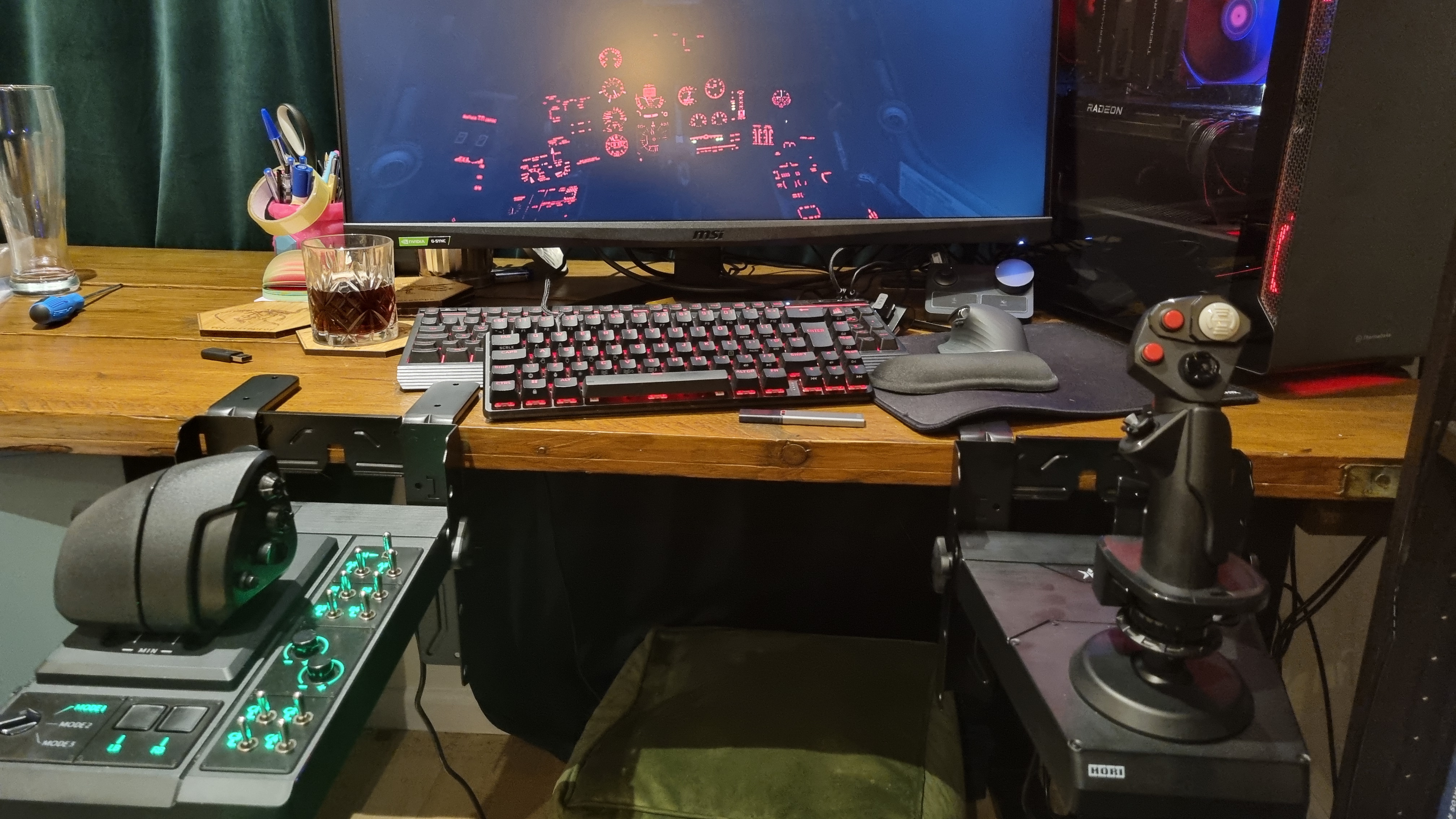 The Hori HOTAS flight control system mounted to a desk and playing DCS World