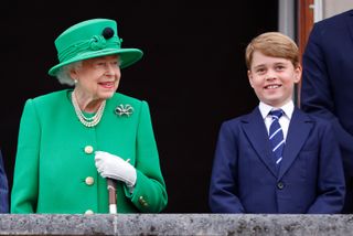 Queen Elizabeth II and Prince George of Cambridge stand on the balcony of Buckingham Palace following the Platinum Pageant on June 5, 2022 in London, England. The Platinum Jubilee of Elizabeth II is being celebrated from June 2 to June 5, 2022, in the UK and Commonwealth to mark the 70th anniversary of the accession of Queen Elizabeth II on 6 February 1952.