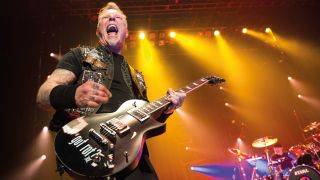 A photograph of James Hetfield on stage