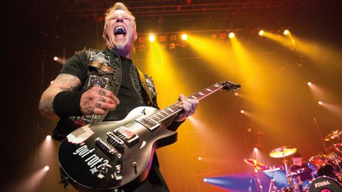 A photograph of James Hetfield on stage