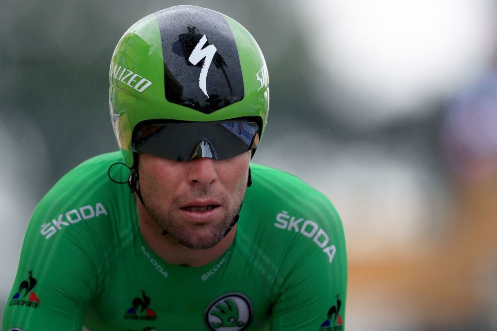 Team Deceuninck Quicksteps Mark Cavendish of Great Britain wearing the best sprinters green jersey crosses the finish line of the 5th stage of the 108th edition of the Tour de France cycling race a 27 km time trial between Change and Laval on June 30 2021 Photo by Christophe Petit Tesson various sources AFP Photo by CHRISTOPHE PETIT TESSONAFP via Getty Images
