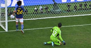 Japan goalkeeper makes unbelievable error to concede Costa Rica's first World Cup 2022 shot on target: Shuichi Gonda looks at the ball after he conceided a goal during the Qatar 2022 World Cup Group E football match between Japan and Costa Rica at the Ahmad Bin Ali Stadium in Al-Rayyan, west of Doha on November 27, 2022