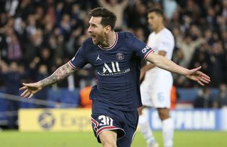 Lionel Messi celebrates after scoring for PSG in the Champions League against Manchester City in September 2021.