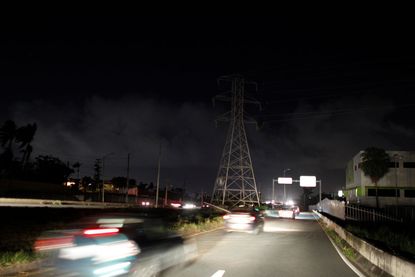 Emergency vehicles stream toward Puerto Rico power plant