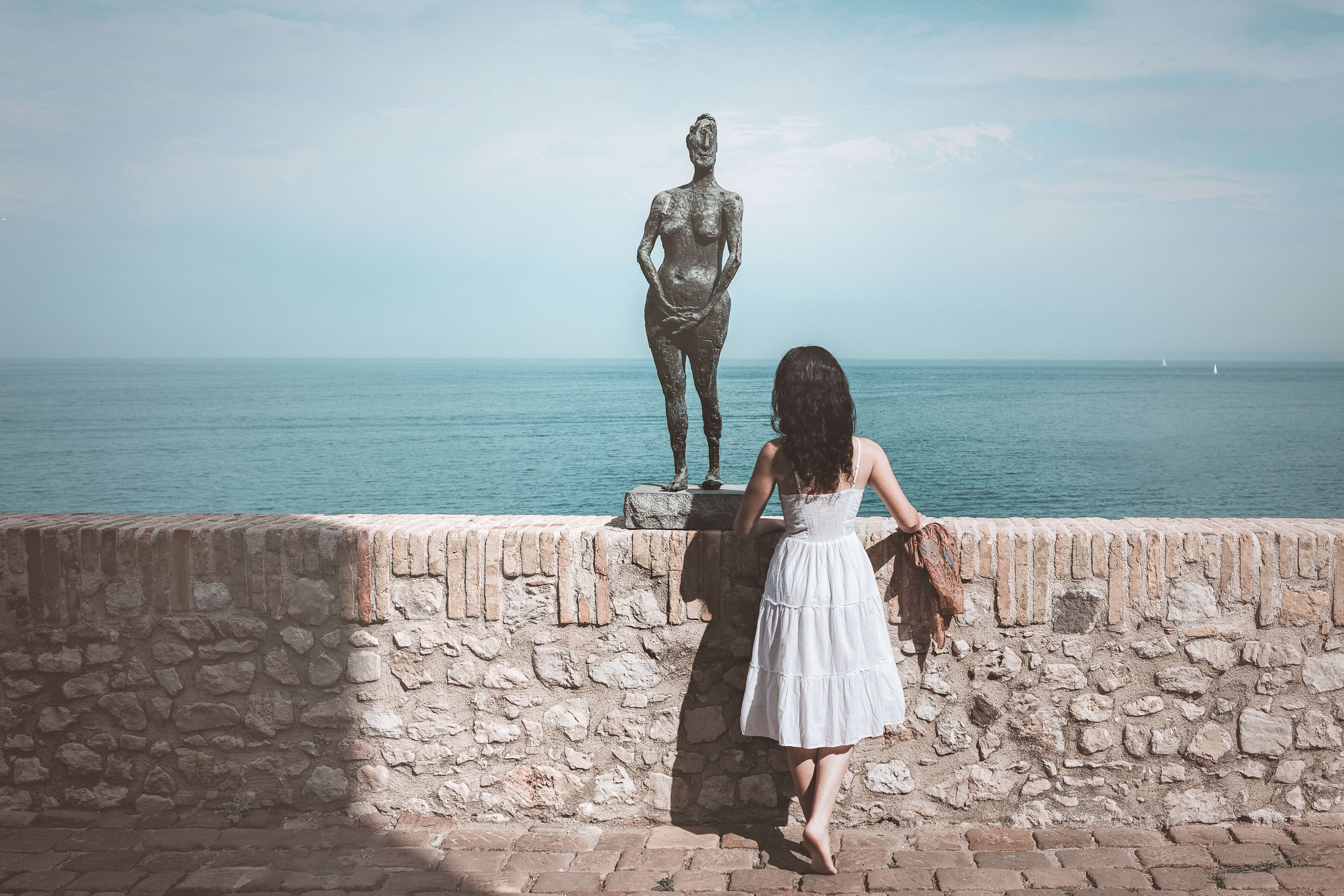 Women looking at out the sea from a high-up terrace in Antibes