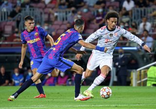 Barcelona in action against Bayern Munich in the 2021/22 Champions League group stages.