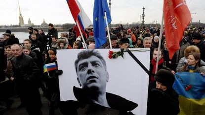 Russia's opposition supporters march in memory of murdered Kremlin critic Boris Nemtsov