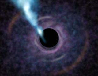 Artist's concept of the huge black hole at the heart of the galaxy M87, the most massive known black hole to date. Gas swirls around the black hole in an accretion disk. The bright blue jet shooting from the region of the black hole is created by gas that