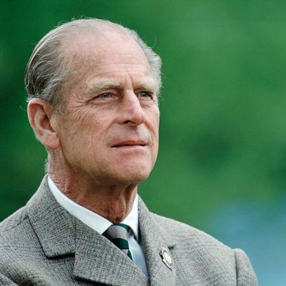 Prince Philip wearing a suit looking thoughtful