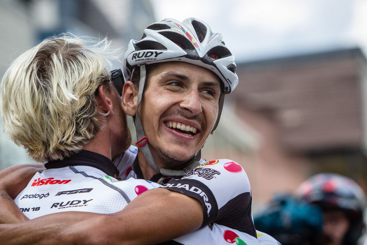Lachlan Morton (Jelly Belly) celebrates after taking the win