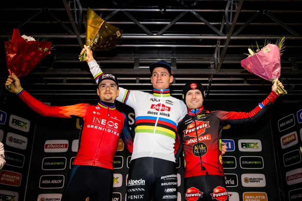 British Thomas Tom Pidcock, Dutch Mathieu Van Der Poel and Belgian Eli Iserbyt pictured on the podium after the men elite race of Cross Diegem cyclocross cycling event, Thursday 28 December 2023 in Diegem, stage 7/8 in the Superprestige cyclocross cycling competition. BELGA PHOTO JASPER JACOBS (Photo by JASPER JACOBS / BELGA MAG / Belga via AFP)