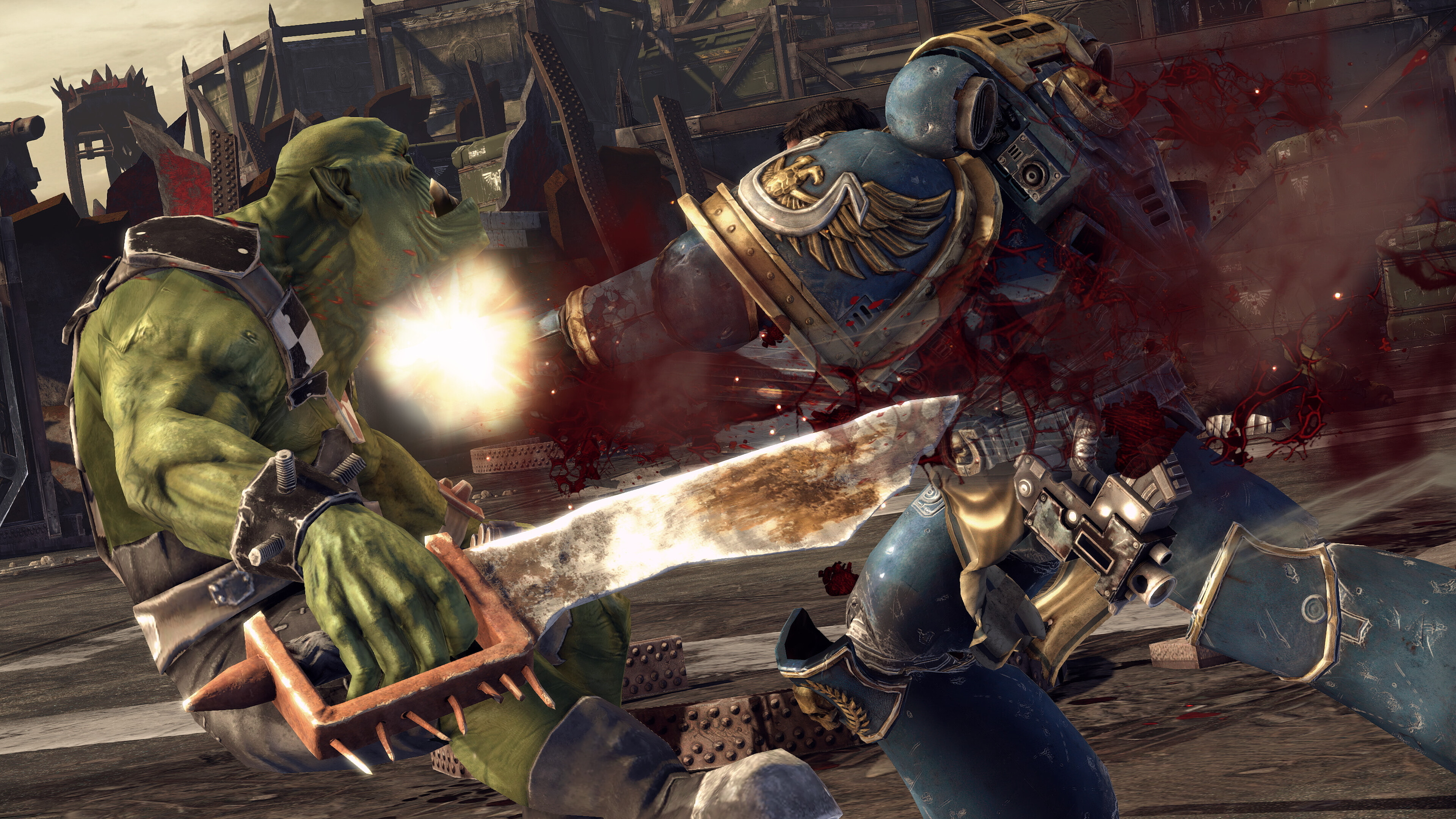 Promotional screenshot of a Ork being killed by a Space Marine in Warhammer 40,000: Space Marine Master Crafted Edition