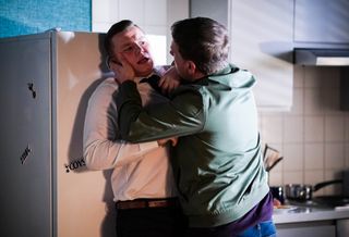 Neil attacks Aaron Monroe in EastEnders