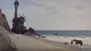 The iconic ending of Planet of the Apes, with the Statue of Liberty on the beach
