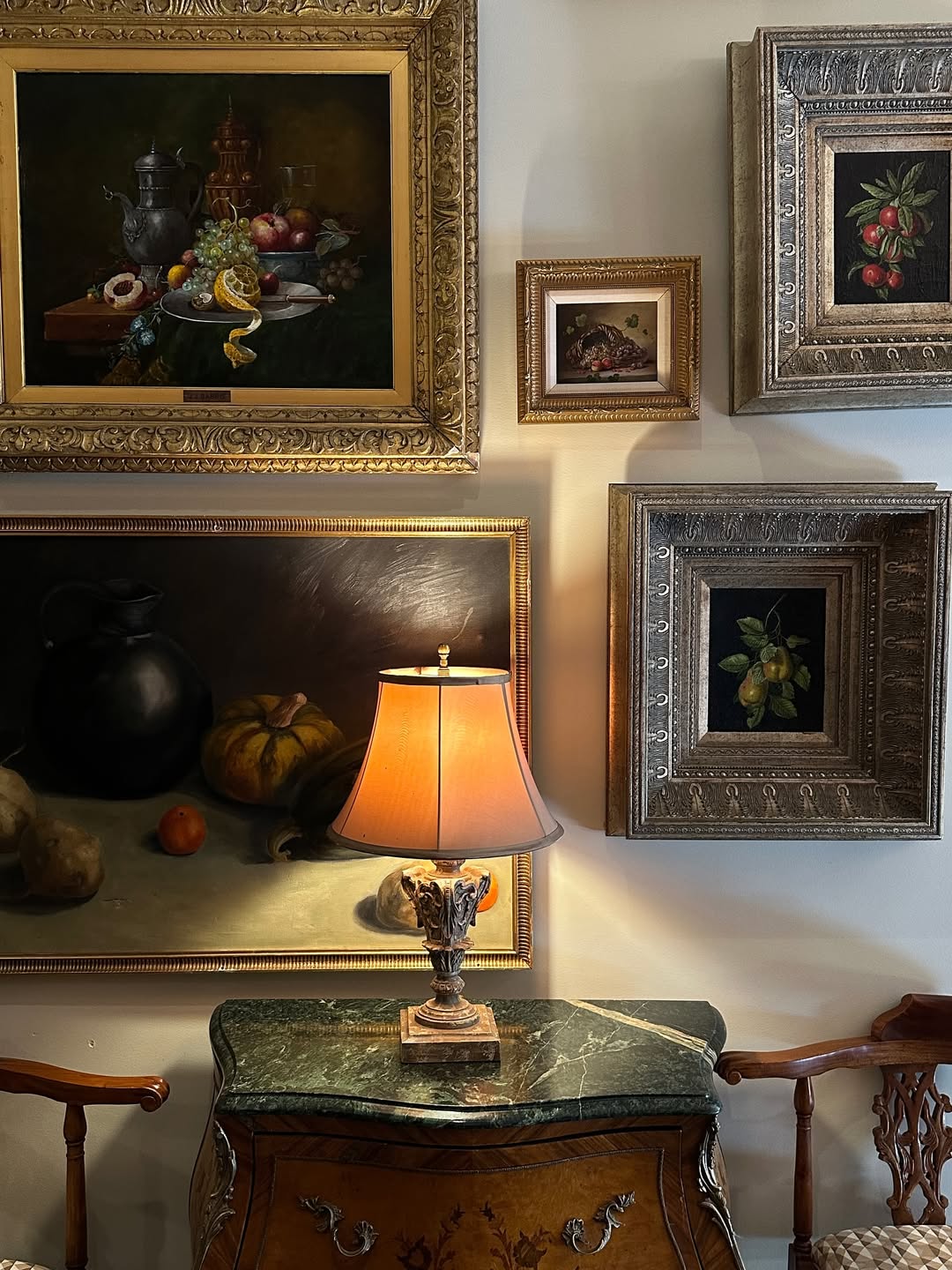 Framed prints and artwork in an antique style
