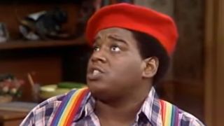 Close up of Fred Berry as Rerun, wearing his red beret