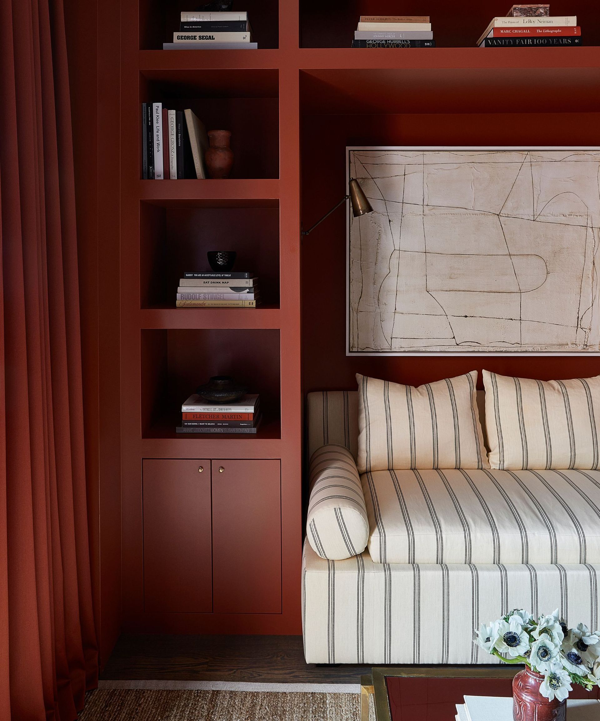 red room cabinets with stripe sofa