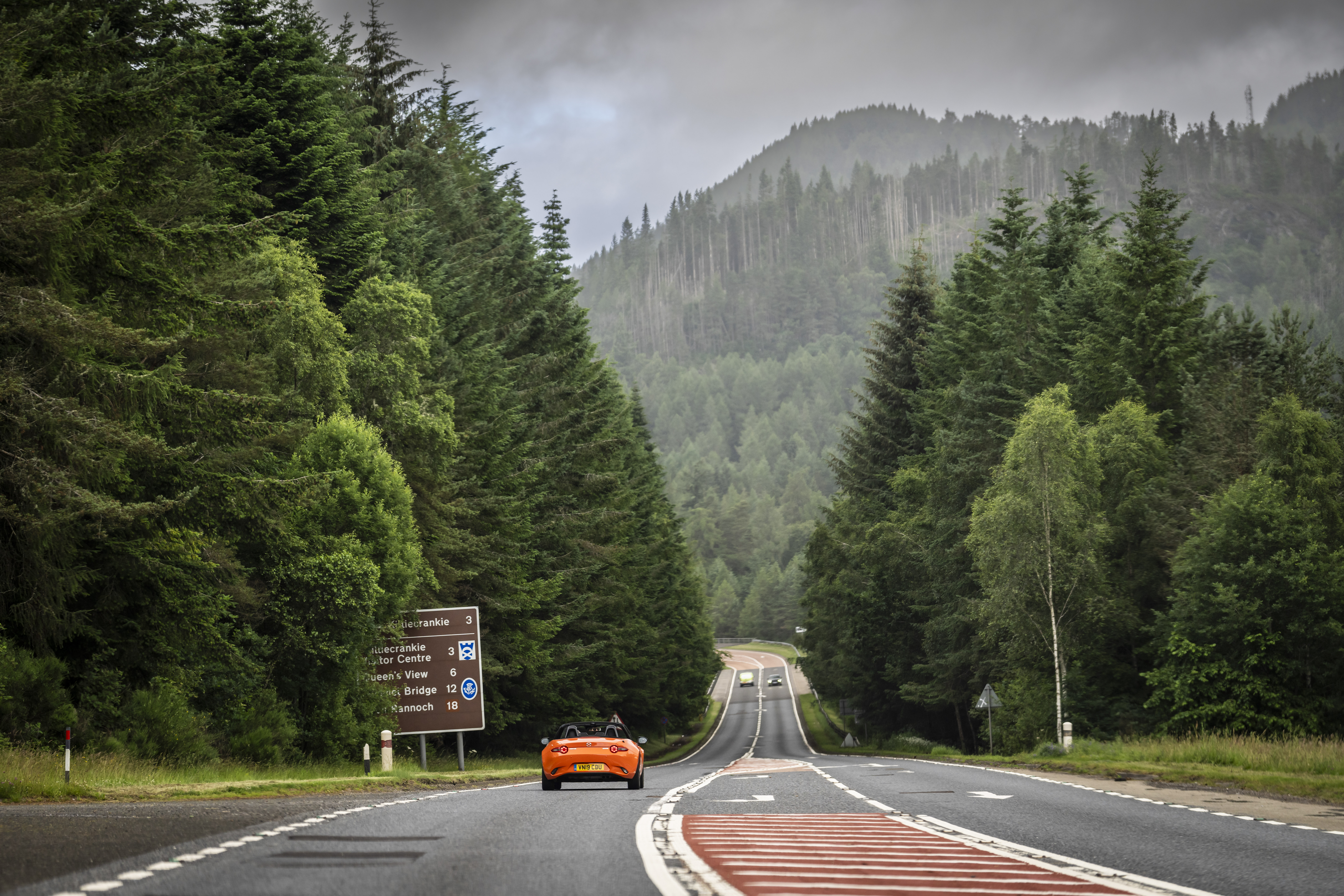 A mazda MX5, zooming through great britain