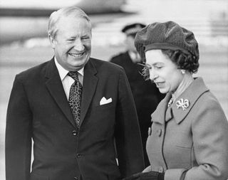Ted Heath (left) with the Queen (right)