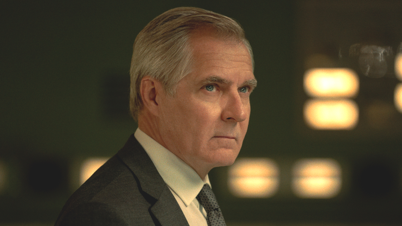 Henry Czerny stands stoically in a mysterious room in Mission: Impossible - The Final Reckoning.