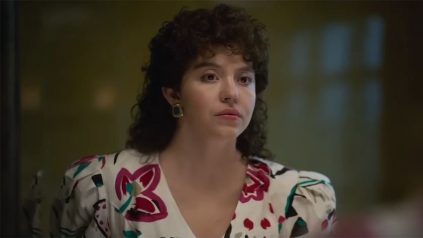 Sydney Sweeney with eighties cut, bold floral dress and perm in Christy.