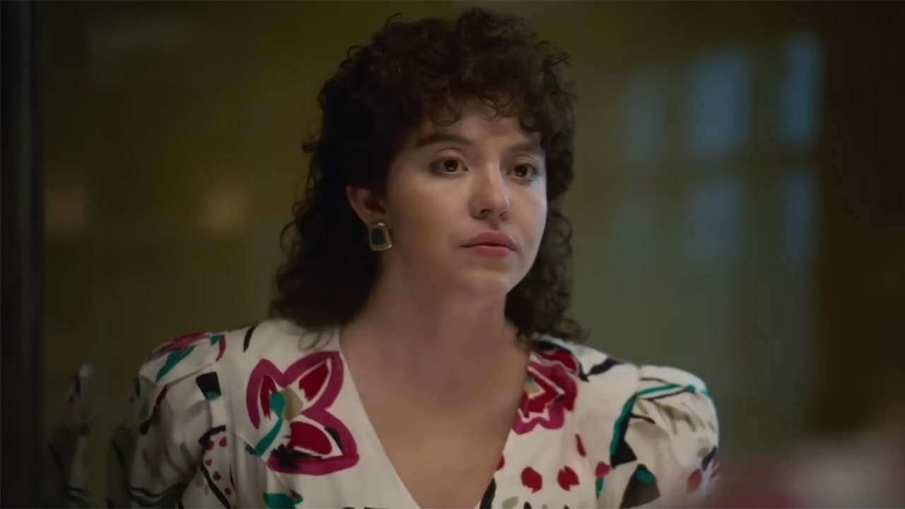 Sydney Sweeney with eighties cut, bold floral dress and perm in Christy.
