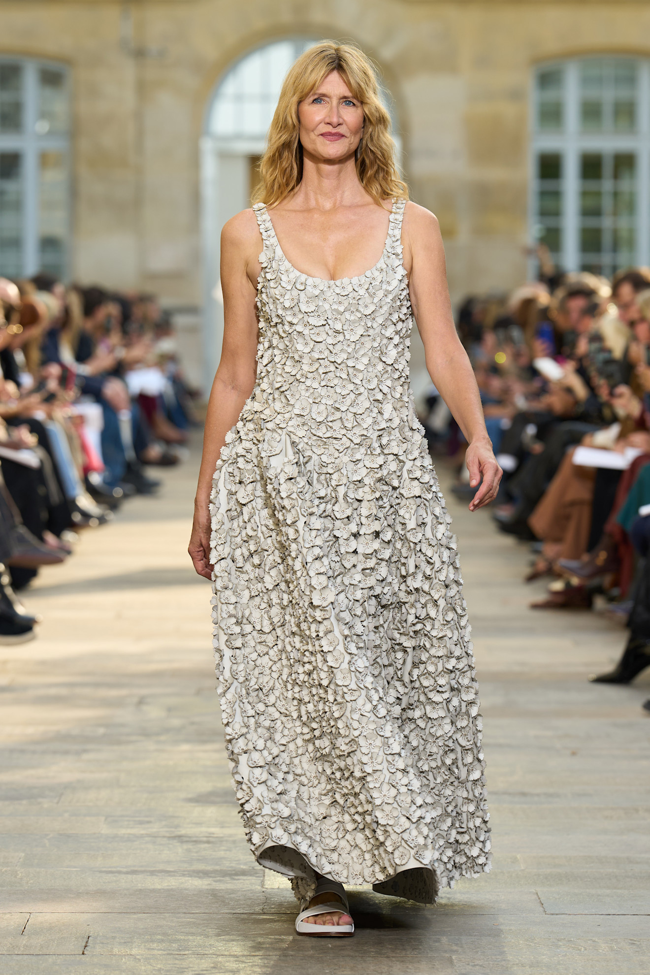 Laura Dern started the Gabriela Hearst Paris Fashion Week show in a white dress and sandals