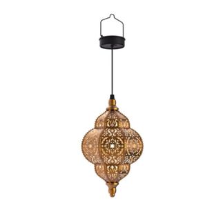A hanging Moroccan lamp with a brass colored base and a teardrop shape with cut-outs