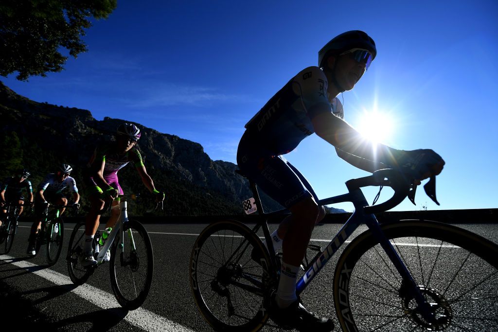 LLOSETA SPAIN JANUARY 28 Silhouette of Christopher Jensen of Denmark and Team Bikeexchange Jayco competing during the 31st Challenge Ciclista Mallorca 2022 Trofeo Serra De Tramuntana a 1589km race from Lloseta to Lloseta ChallengeMallorca on January 28 2022 in Lloseta Spain Photo by Tim de WaeleGetty Images