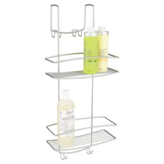 A chrome over-the-door shower caddy with bottles in it