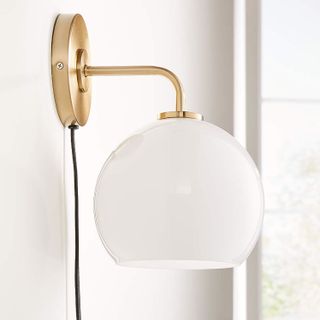 Arren Brass Plug In Wall Sconce with Milk Round Shade