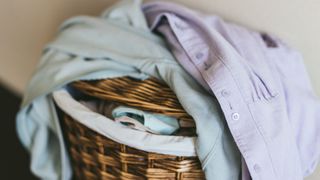 An overflowing washing basket