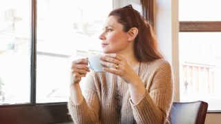 A woman sitting in a cafe