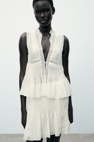 2wosjYE2tXtsdRkbcrNxsh-320-80 قمة Zara Tank المثالية بقيمة 16 دولارًا و 23 الوافدين الجدد للتسوق