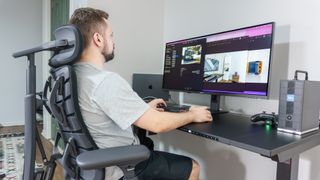 A person working on the Innocn 40C1U ultrawide monitor at their desk