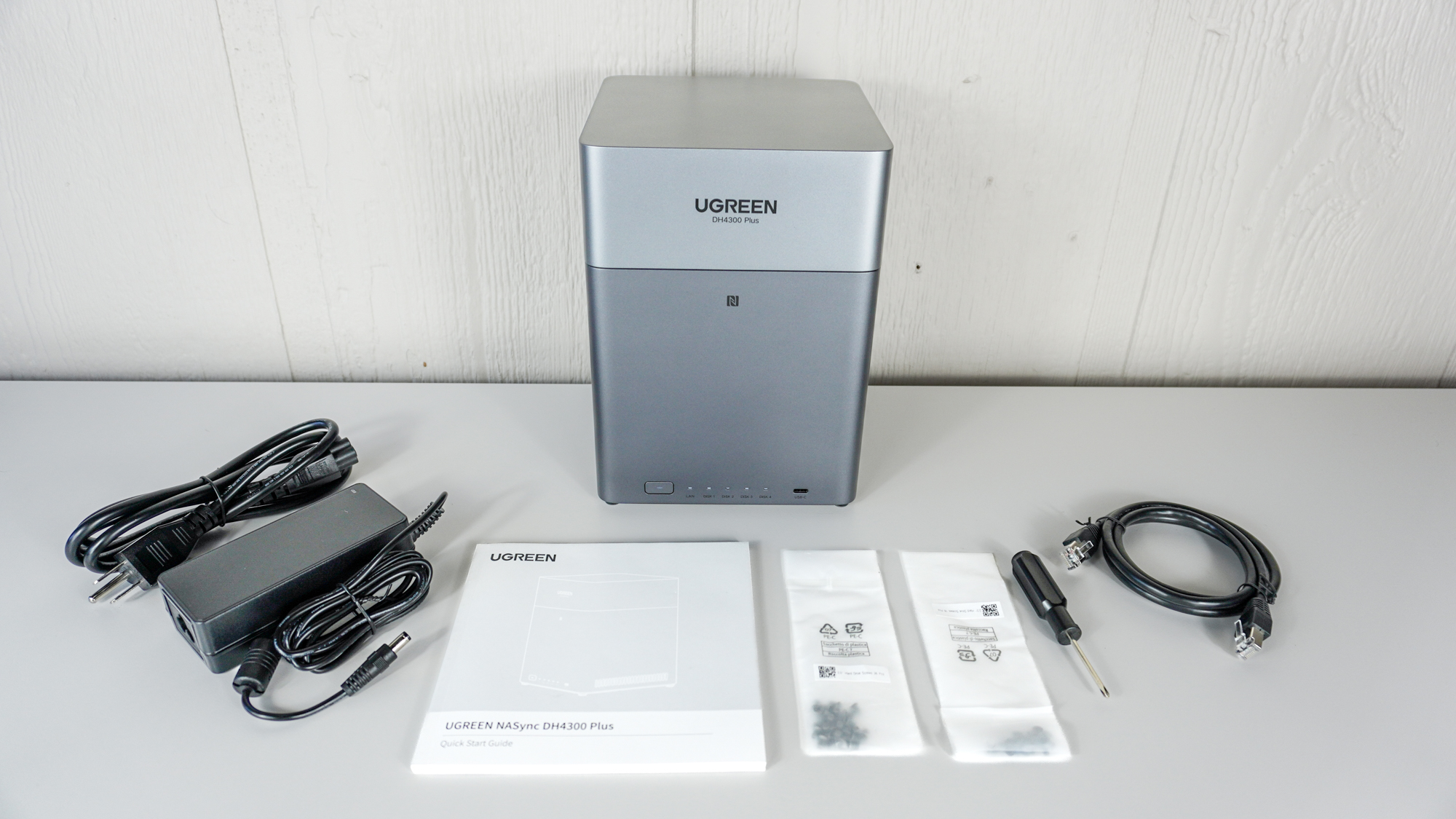 The Ugreen NASync DH4300 Plus unboxed on a table