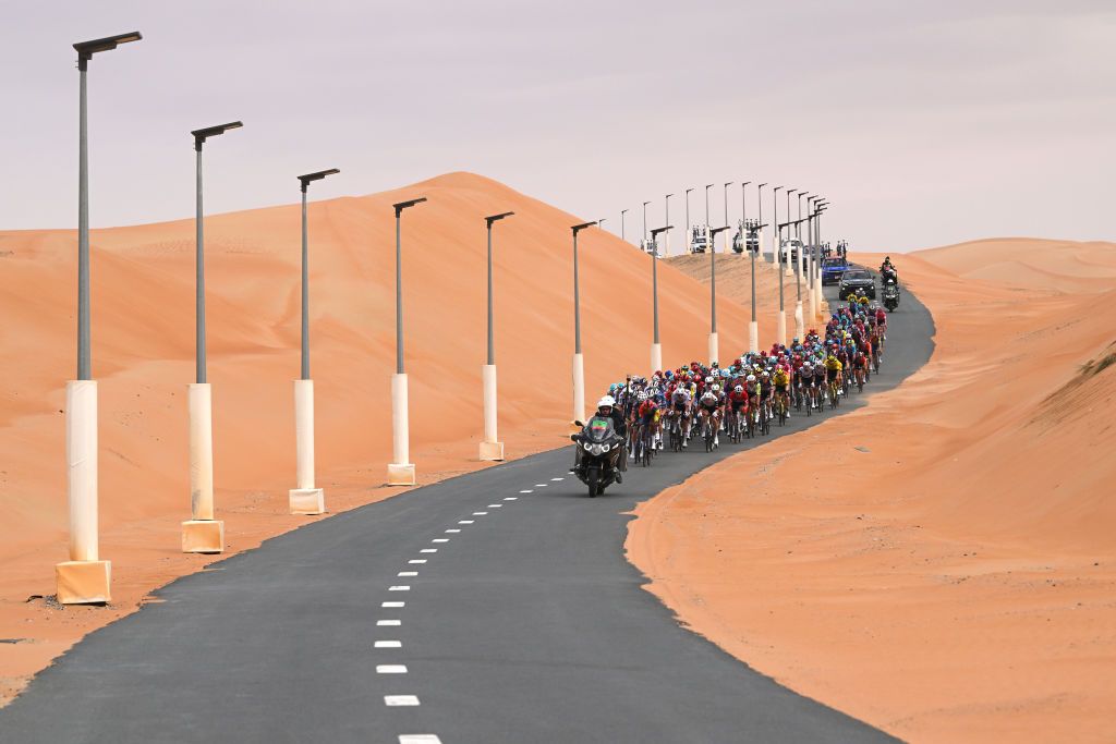 LIWA PALACE ABU DHABI UNITED ARAB EMIRATES FEBRUARY 17 A general view of the peloton competing during the to the 7th UAE Tour Stage 1 a 138km stage from Madinat Zayed Shams Solar Park to Liwa Palace UCIWWT on February 17 2025 in Liwa Palace Abu Dhabi United Arab Emirates Photo by Dario BelingheriGetty Images