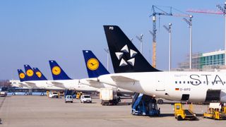 The tails of various passenger aircrafts including Star Alliance and Lufthansa planes
