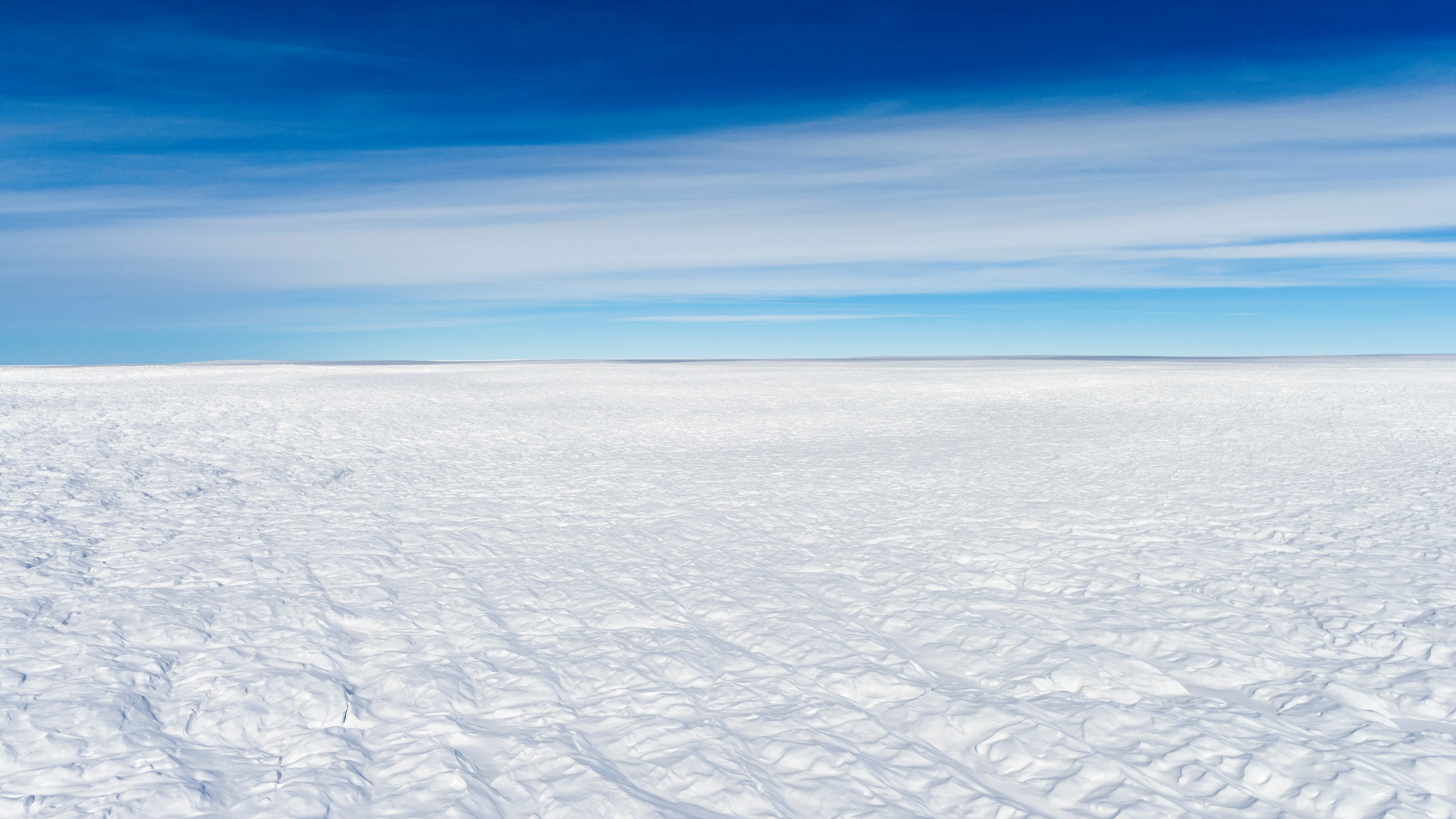 The vast Greenland Ice Sheet plain on a clear day