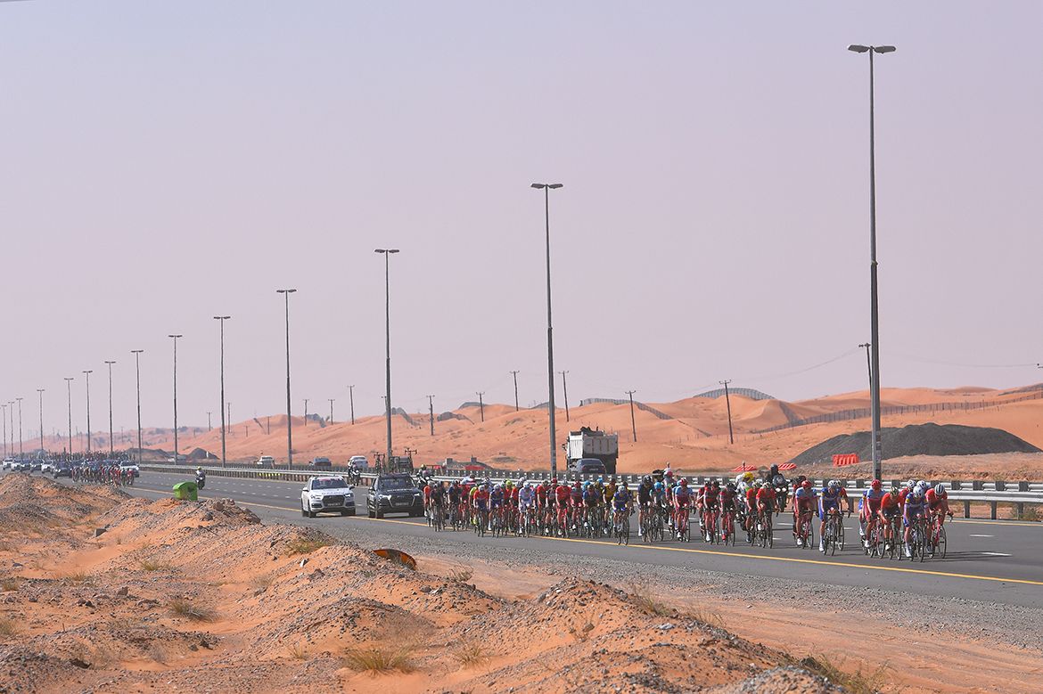 The peloton strings out