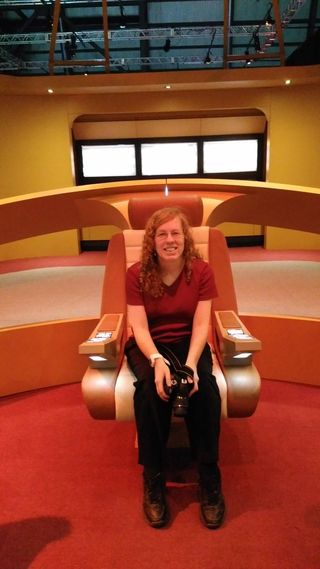 Space.com contributor Elizabeth Howell sits in a captain's chair on a replica bridge from 'Star Trek: The Next Generation.' The chair is part of a touring exhibit called The Starfleet Academy Experience, which Howell saw in Ottawa, Ontario in May, 2016.