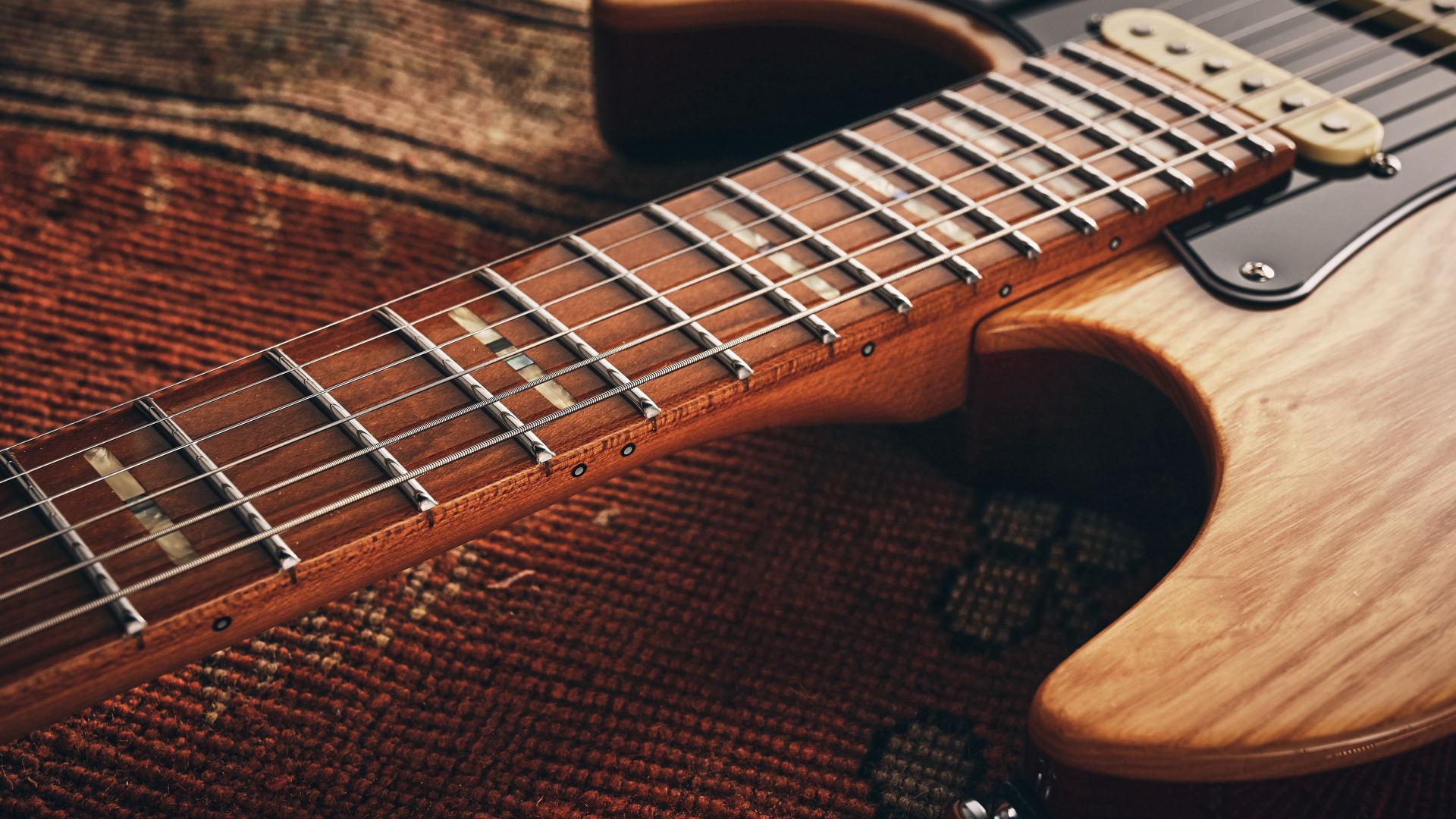 The roasted maple neck of the Sire Larry Carlton S7 Ash Top electric guitar