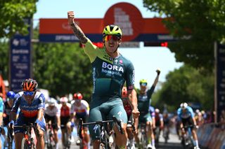 Sam Welsford (BORA-Hansgrohe) celebrates at the finish line of stage 1