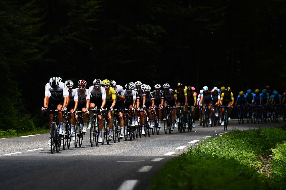 The peloton chases the breakaway during stage 15
