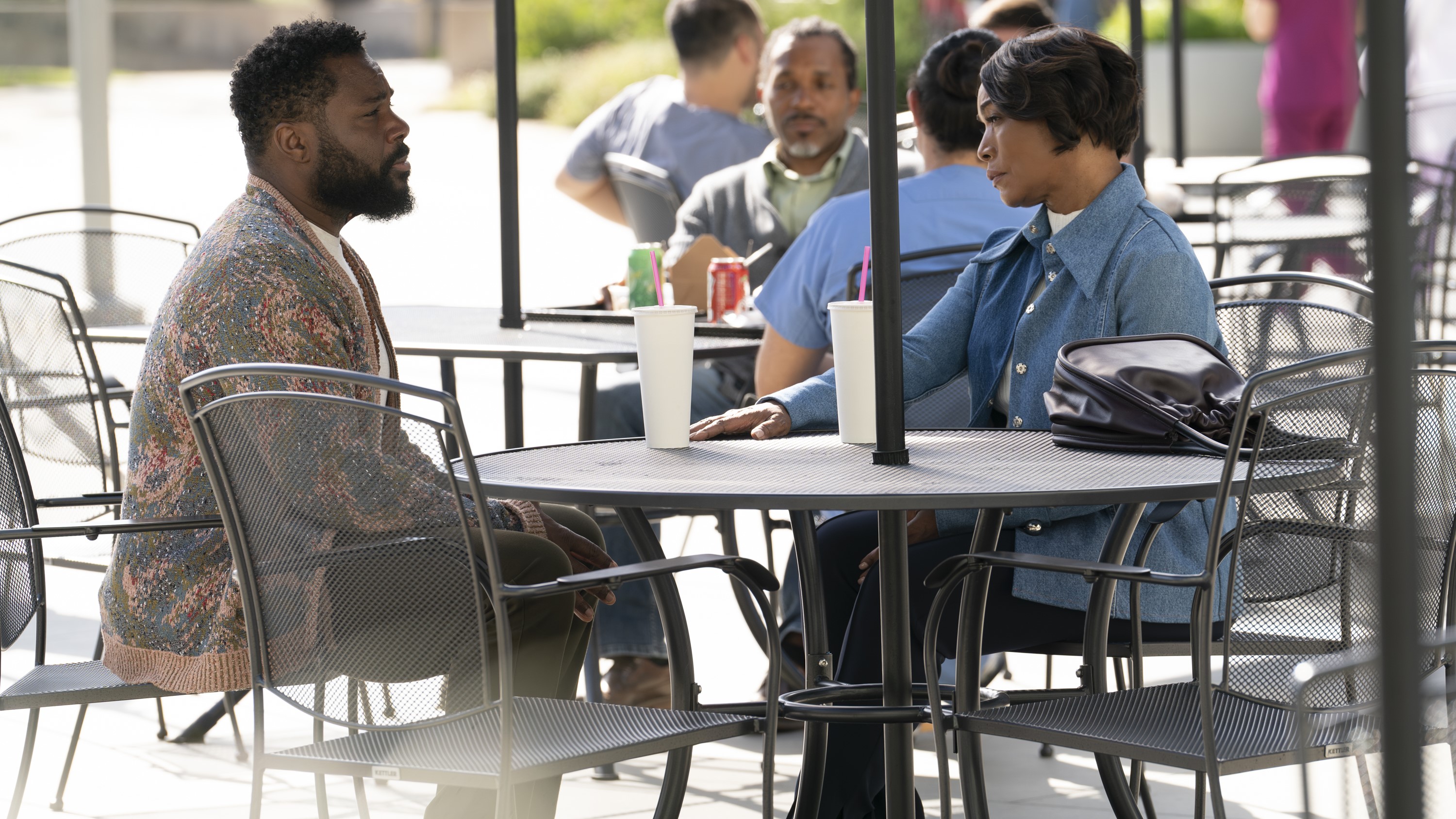 Malcolm-Jamal Warner and Angela Bassett as Amir and Athena eating in 9-1-1 season 7