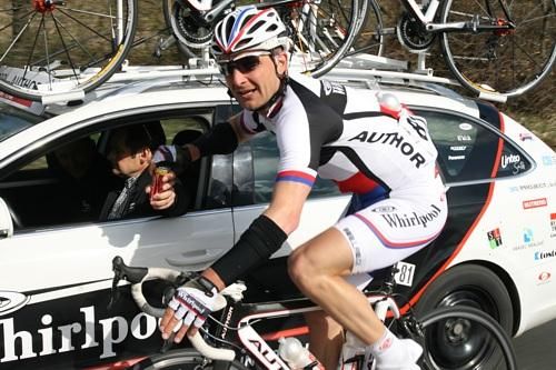 Petr Bencik (PSK Whirlpool - Author) grabs a drink from the team car.